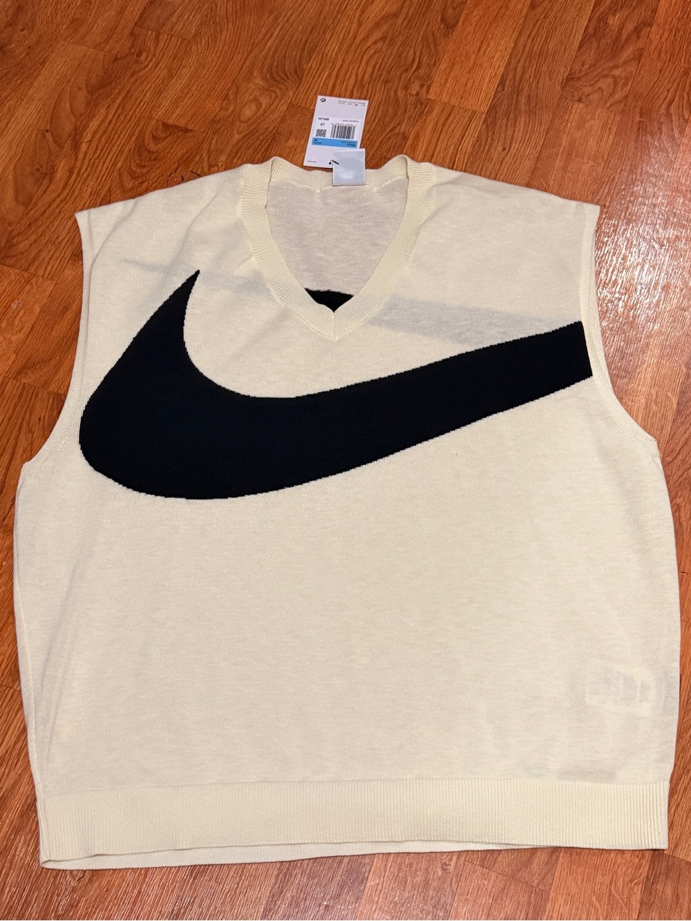 Nike Cream Sleeveless Sweater Vest with Black Swoosh Logo